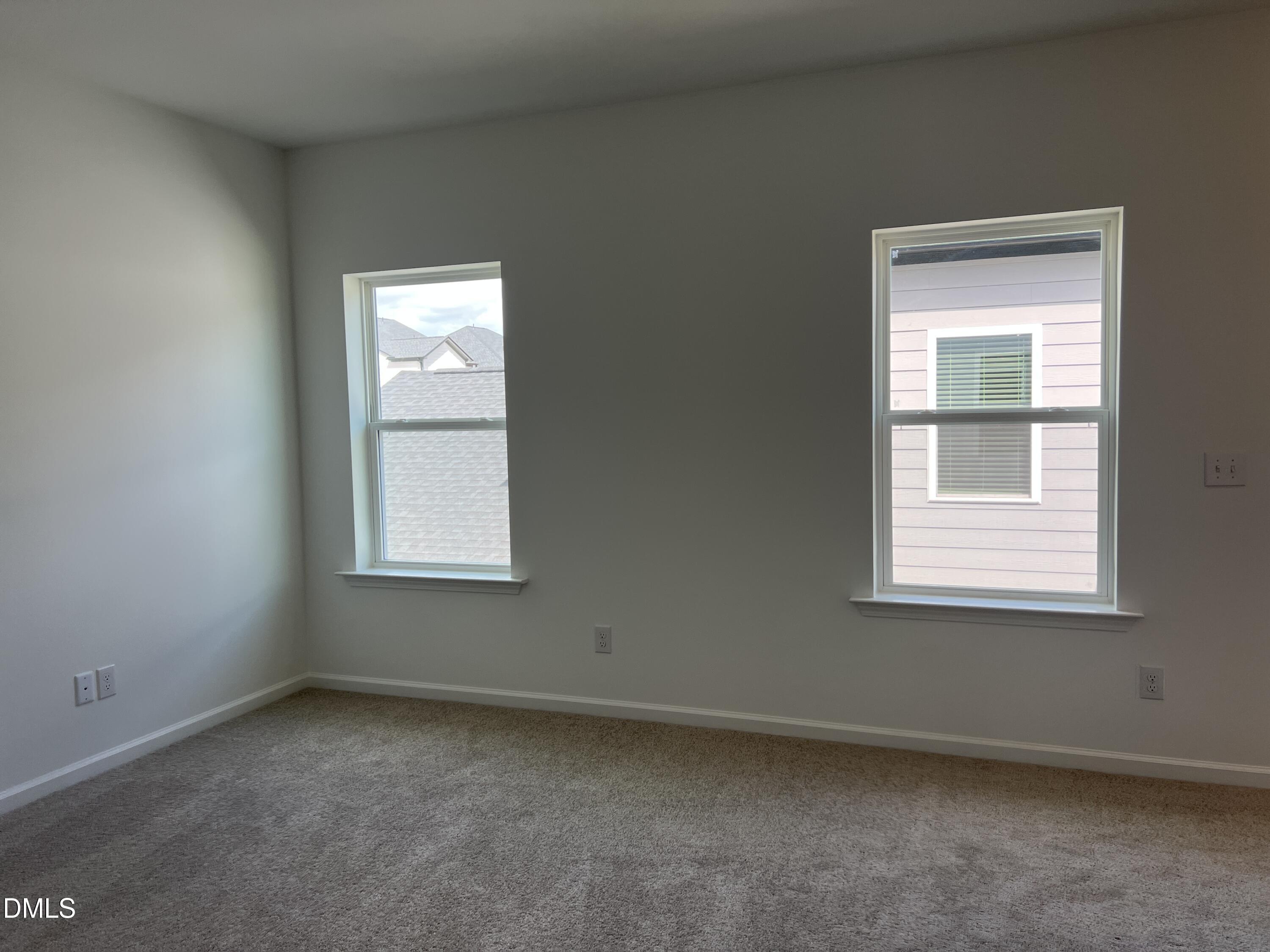 4305 Darius Lane, Unit 27 Willow Spring, NC 27592 - Photo 17 of 18 an empty room with a window