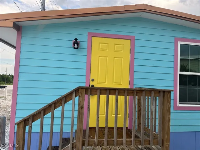 a front view of a house with a garage