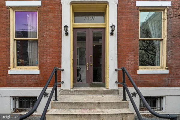 a front view of a house with a porch