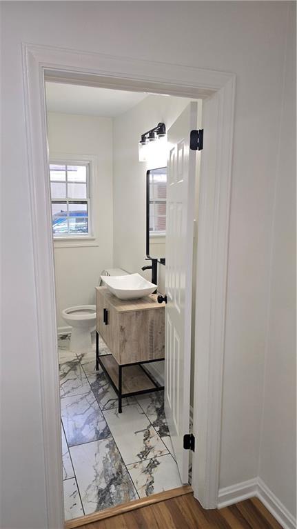 2084 Snow Road Southwest Atlanta, GA 30311 - Photo 40 of 53 a bathroom with a sink toilet and shower