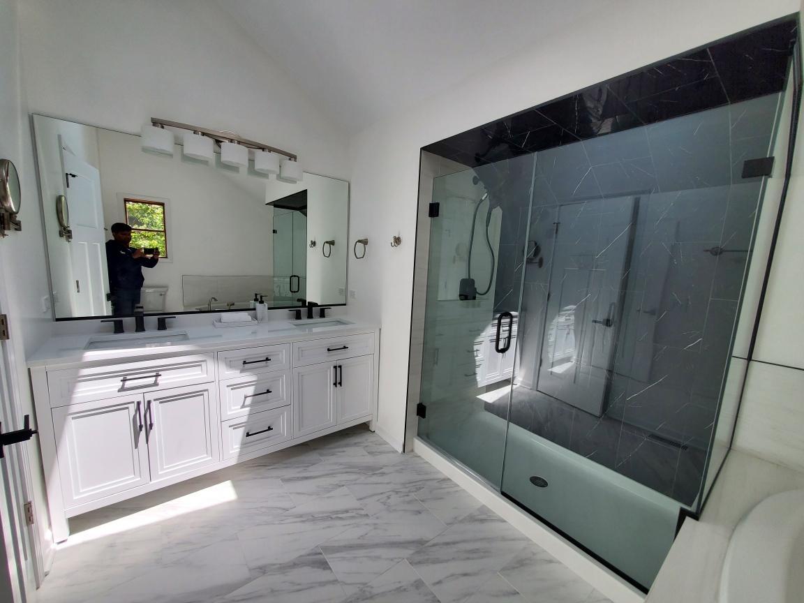 2054 Brookside Lane Aurora, IL 60502 - Photo 31 of 39 a bathroom with a granite countertop sink mirror and bathtub