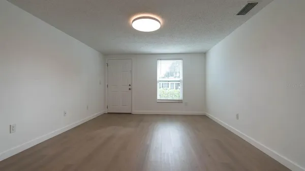 a kitchen with a refrigerator sink and microwave