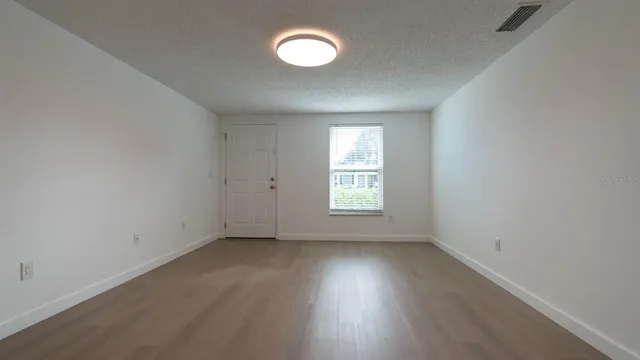 a kitchen with a refrigerator sink and microwave