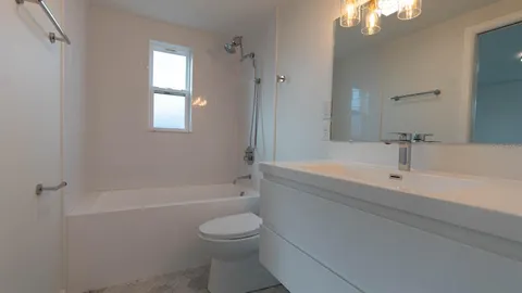 a kitchen with a refrigerator stove and microwave