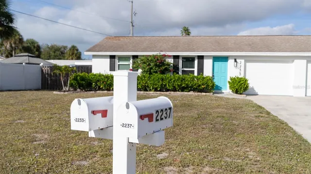 a front view of house with yard