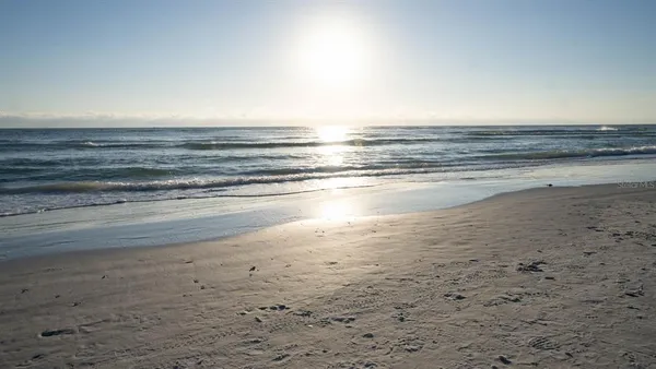 a view of a patio with swimming pool