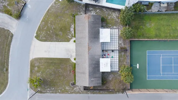 an aerial view of a house with a garden