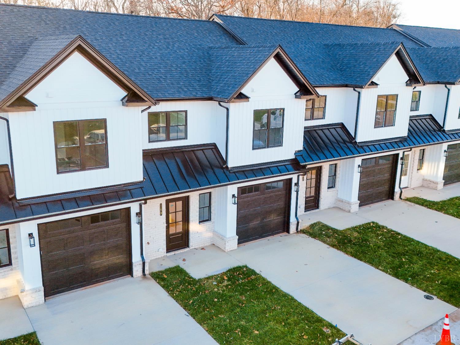169 Luke Court Rustburg, VA 24588 - Photo 2 of 47 a front view of a house with garden