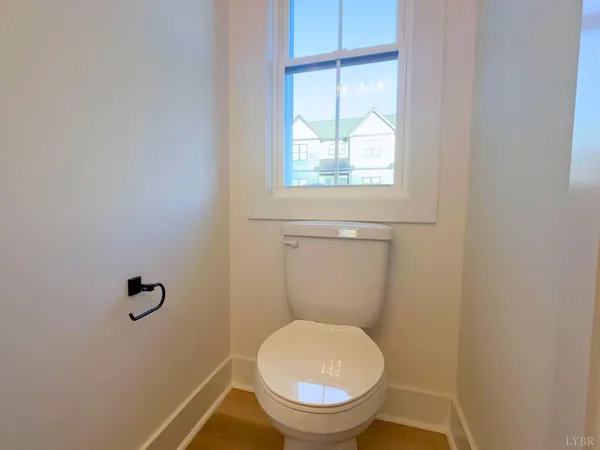 a bathroom with a shower and toilet