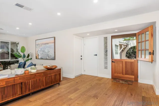 a living room with furniture and window