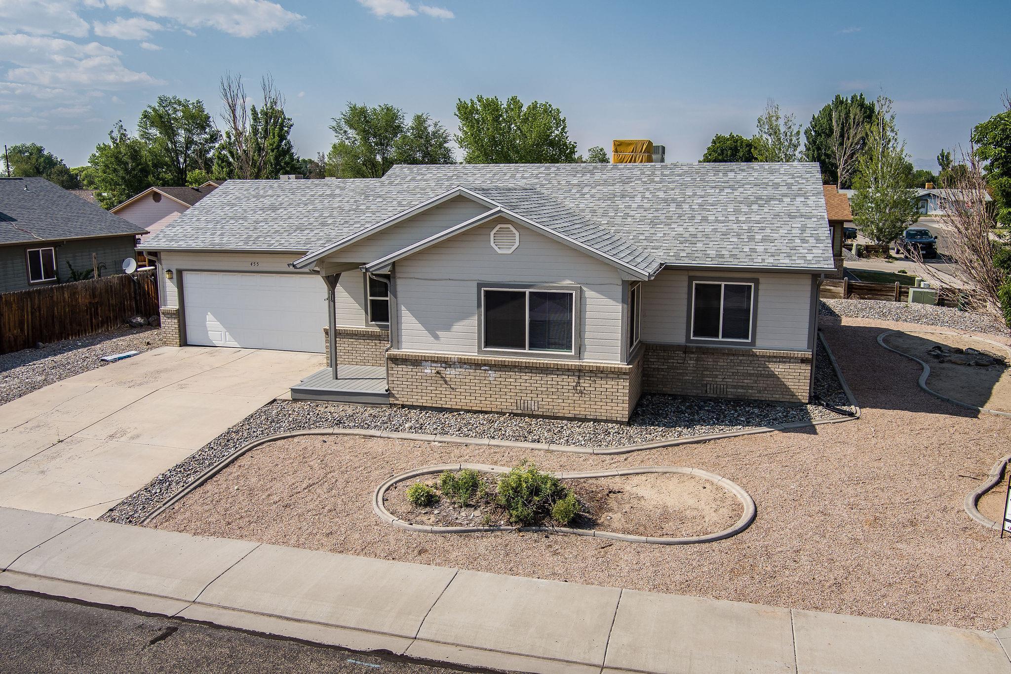 455 David Court Fruita, CO 81521 - Photo 21 of 28 a house view with a outdoor space