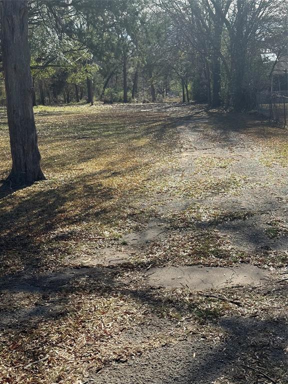 3015 Standard Oil Road Shreveport, LA 71108 - Photo 2 of 2 a view of outdoor space with trees