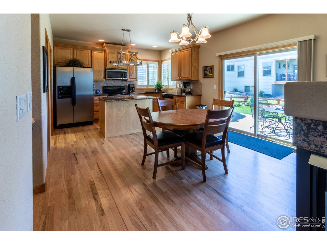 6334 West 13th St Road Greeley, CO 80634 - Photo 11 of 32 Dining Area. Wood Flooring