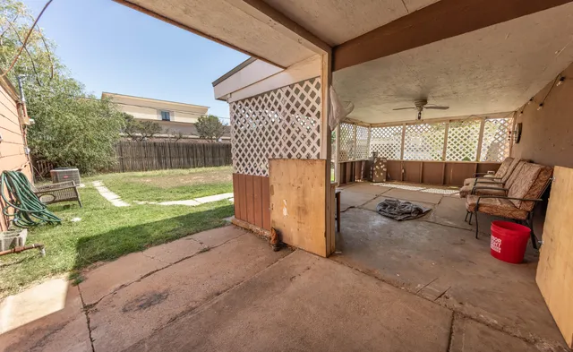 a view of a living room and outdoor space