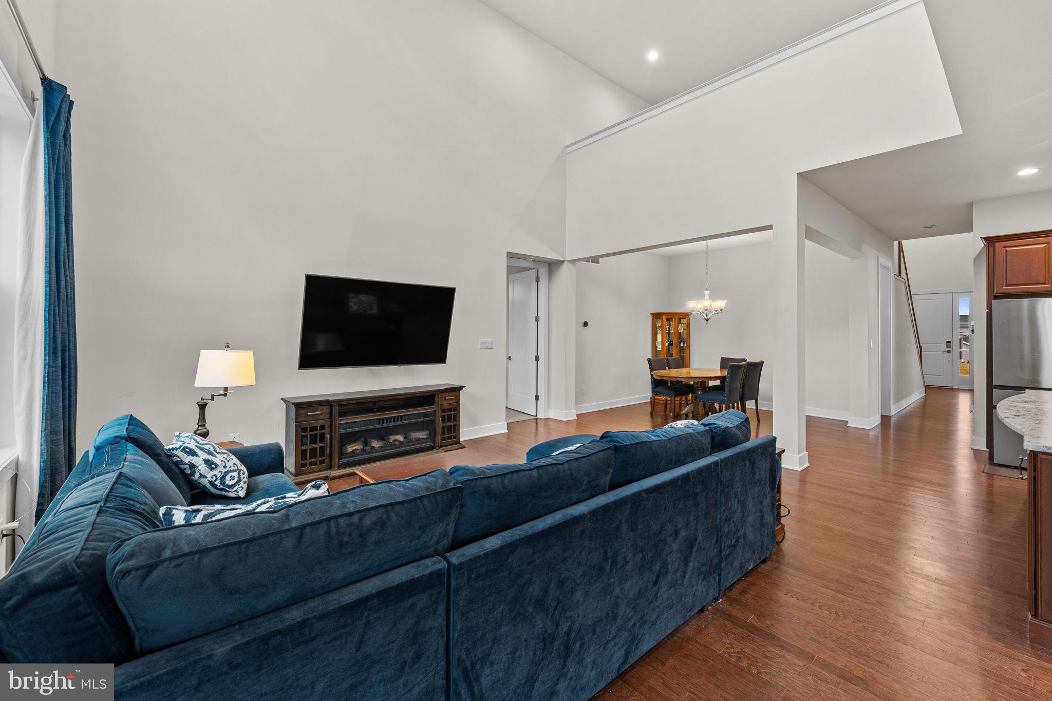 735 Appaloosa Road Downingtown, PA 19335 - Photo 13 of 35 a living room with furniture and a flat screen tv