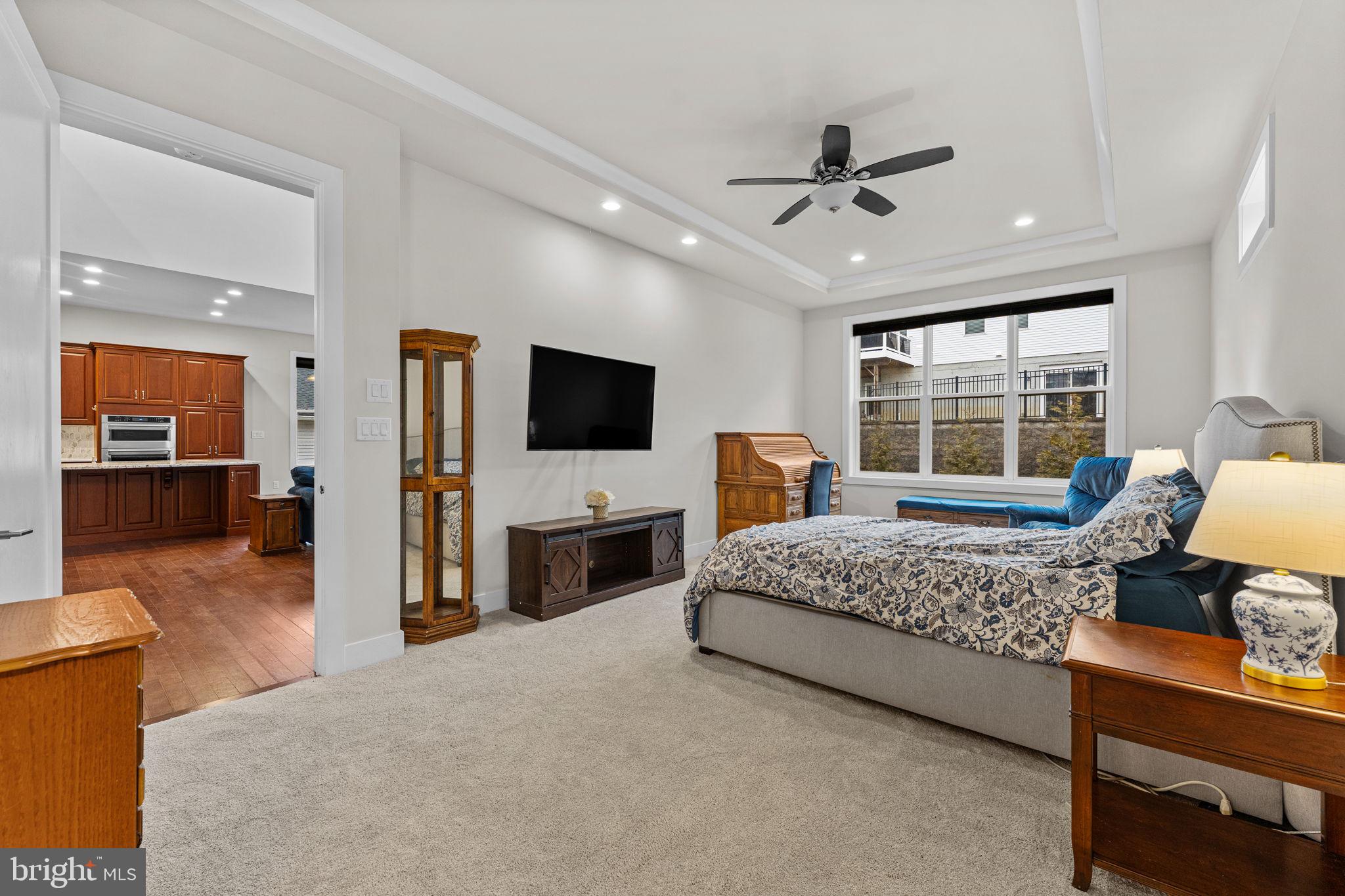 735 Appaloosa Road Downingtown, PA 19335 - Photo 21 of 35 a bedroom with furniture and flat screen tv