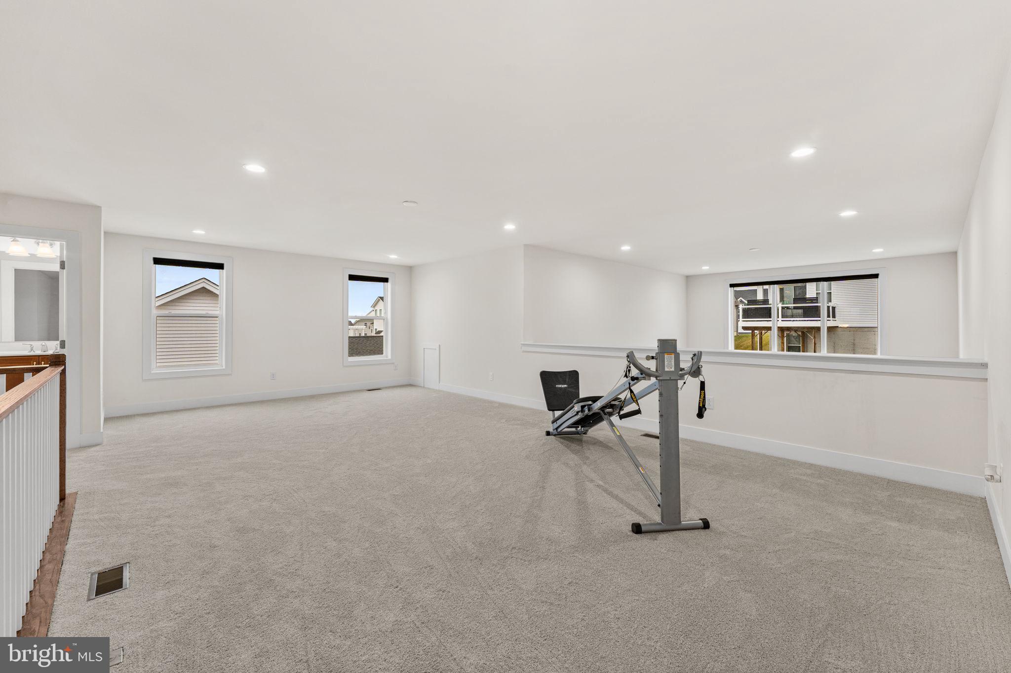 735 Appaloosa Road Downingtown, PA 19335 - Photo 26 of 35 a view of a livingroom with a table and chairs