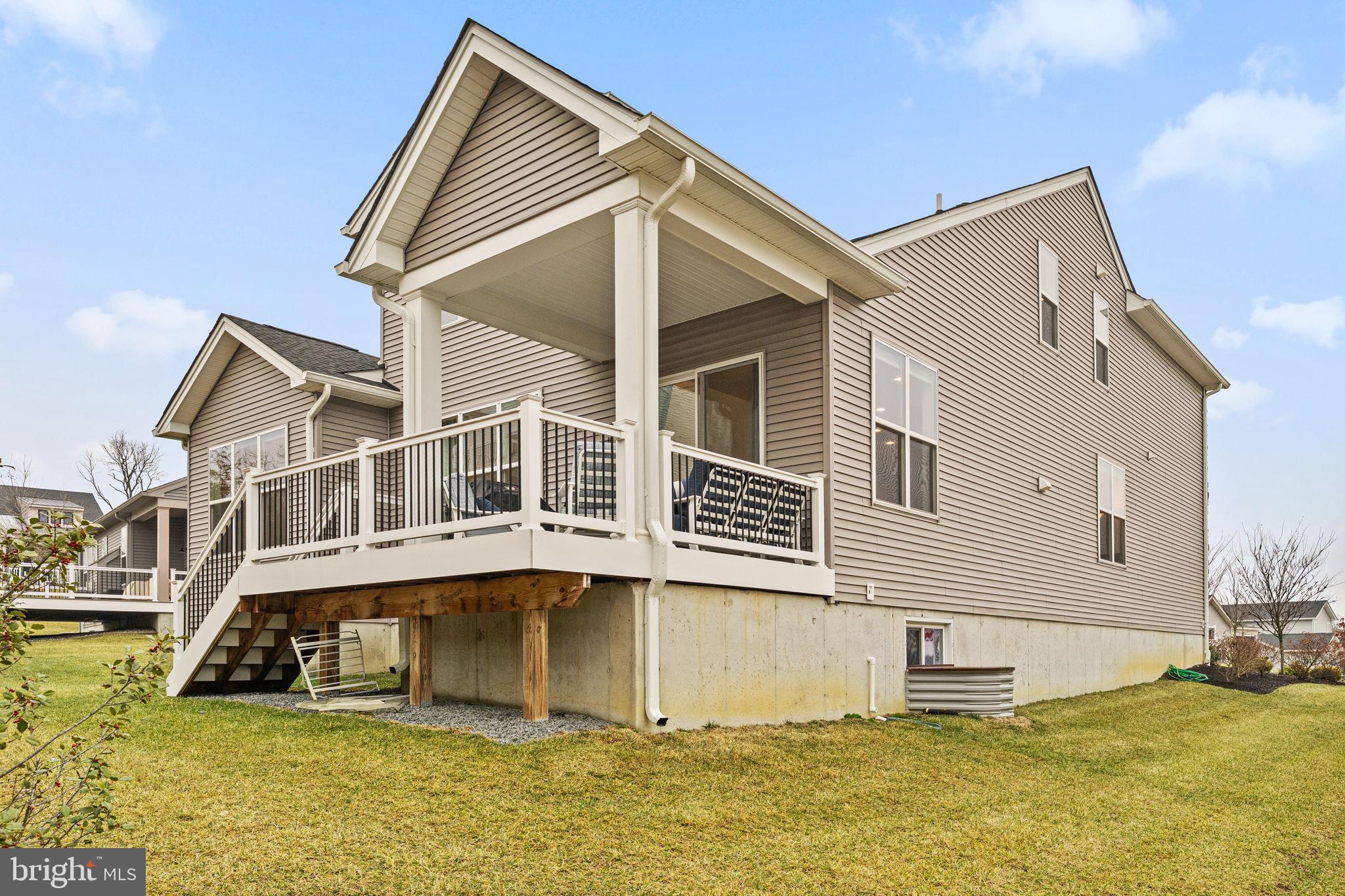 735 Appaloosa Road Downingtown, PA 19335 - Photo 32 of 35 a view of a house with yard and balcony