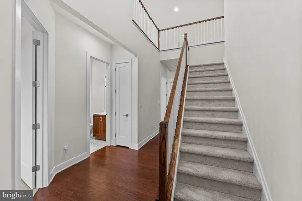 a view of entryway with wooden floor