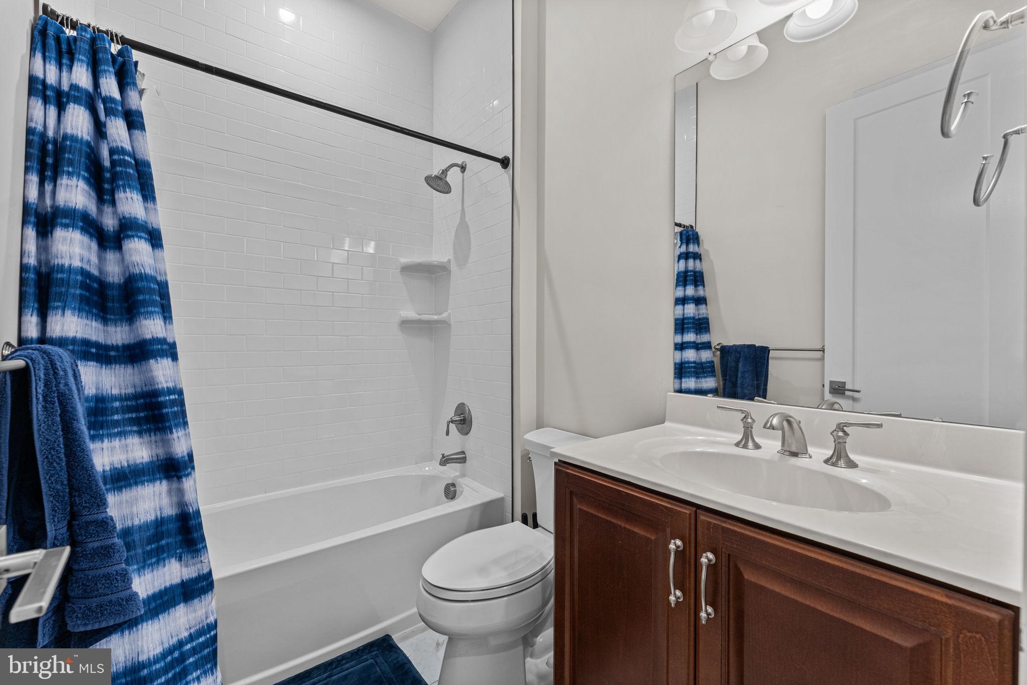 735 Appaloosa Road Downingtown, PA 19335 - Photo 9 of 35 a bathroom with a sink and a mirror