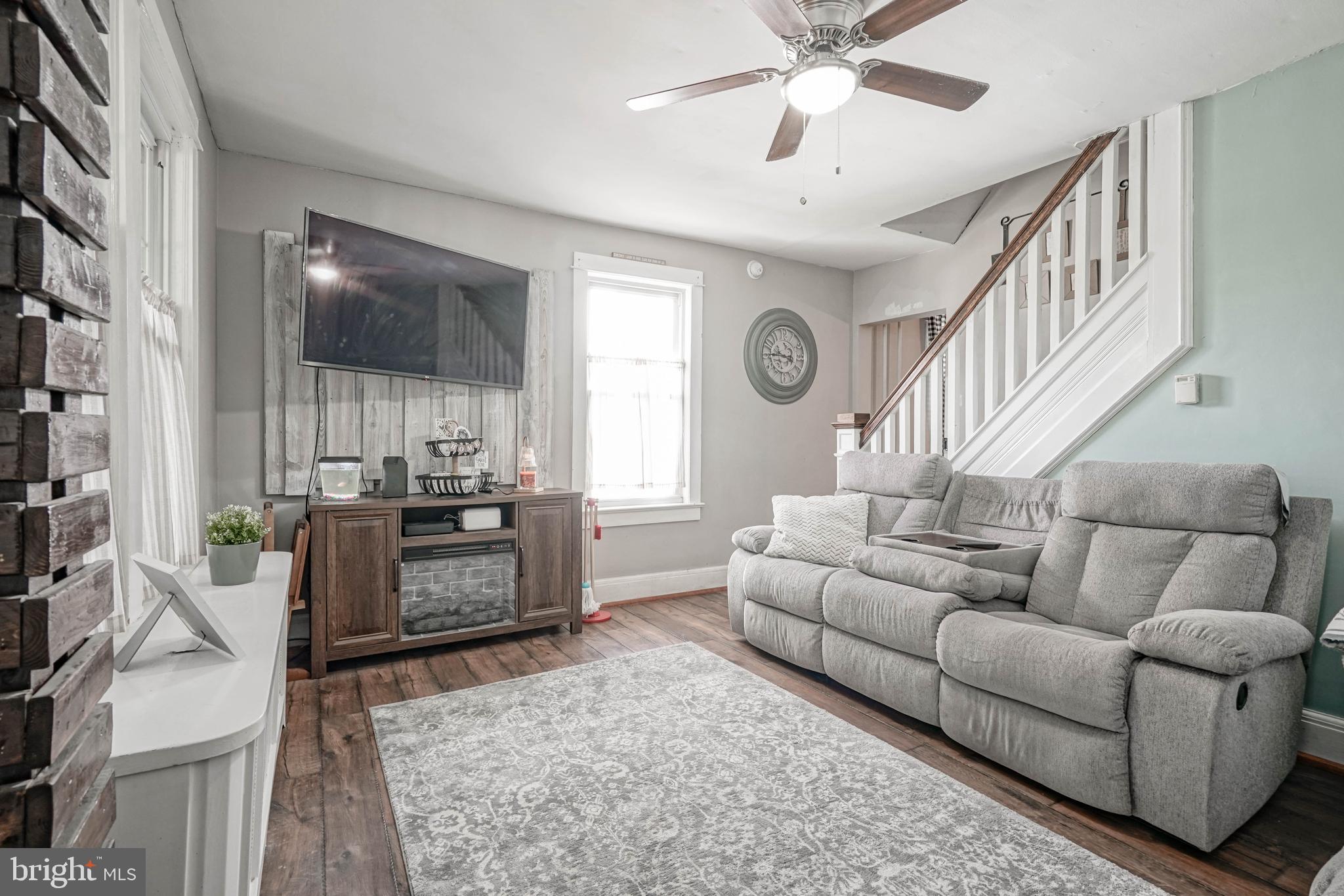 218 Walnut Street Audubon, NJ 08106 - Photo 11 of 40 a living room with furniture and a large window