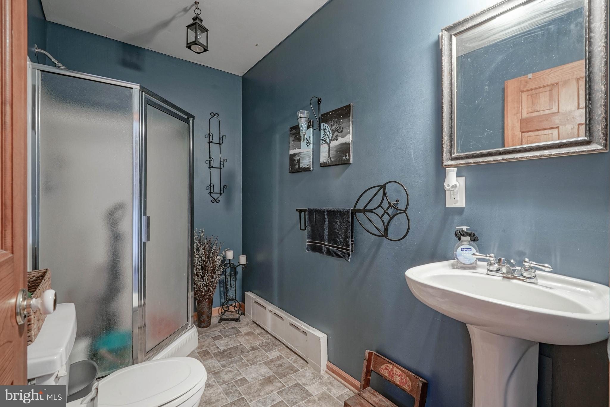 218 Walnut Street Audubon, NJ 08106 - Photo 19 of 40 a bathroom with a sink toilet and shower