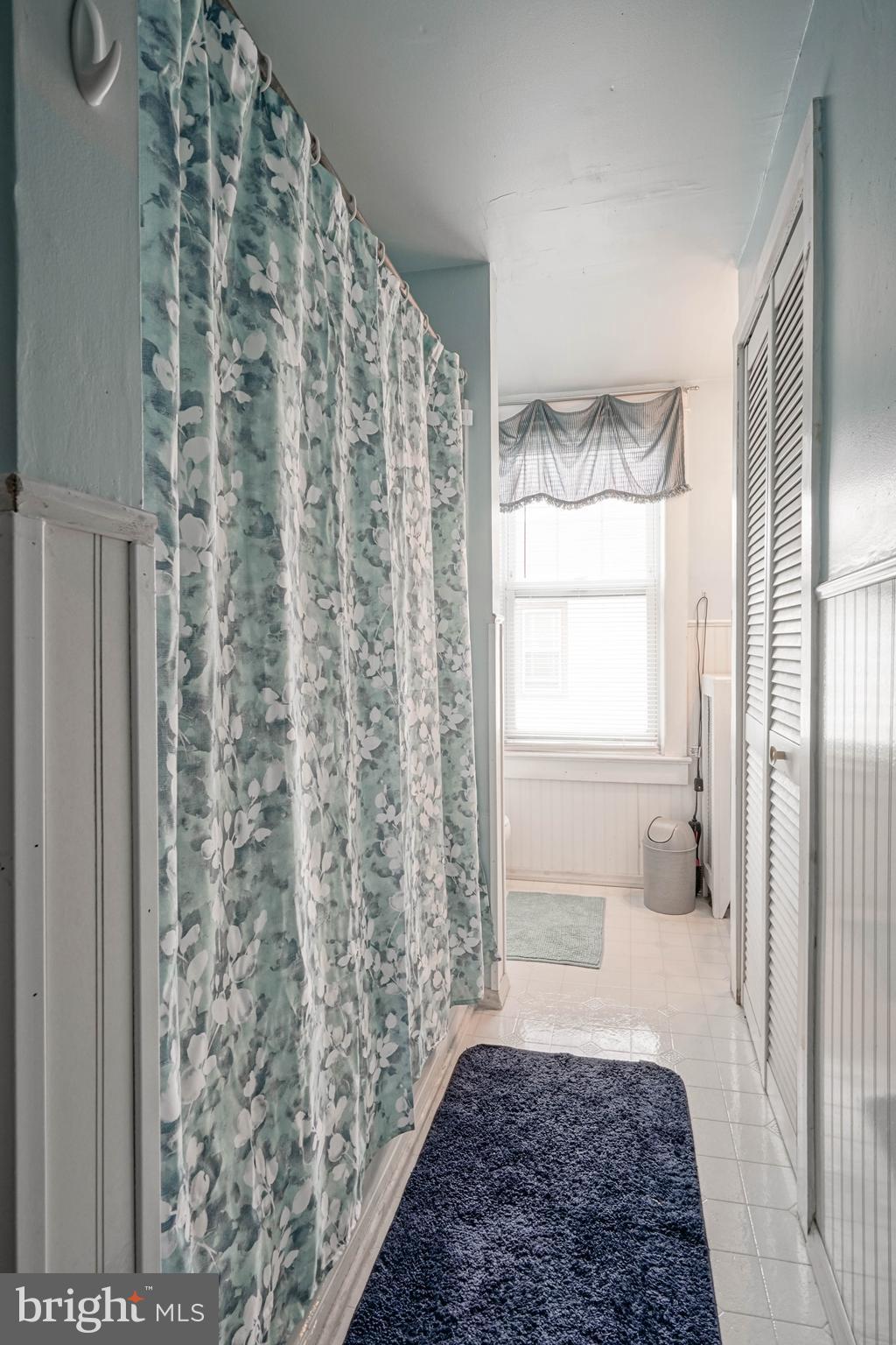 218 Walnut Street Audubon, NJ 08106 - Photo 23 of 40 a bathroom with a bathtub and shower