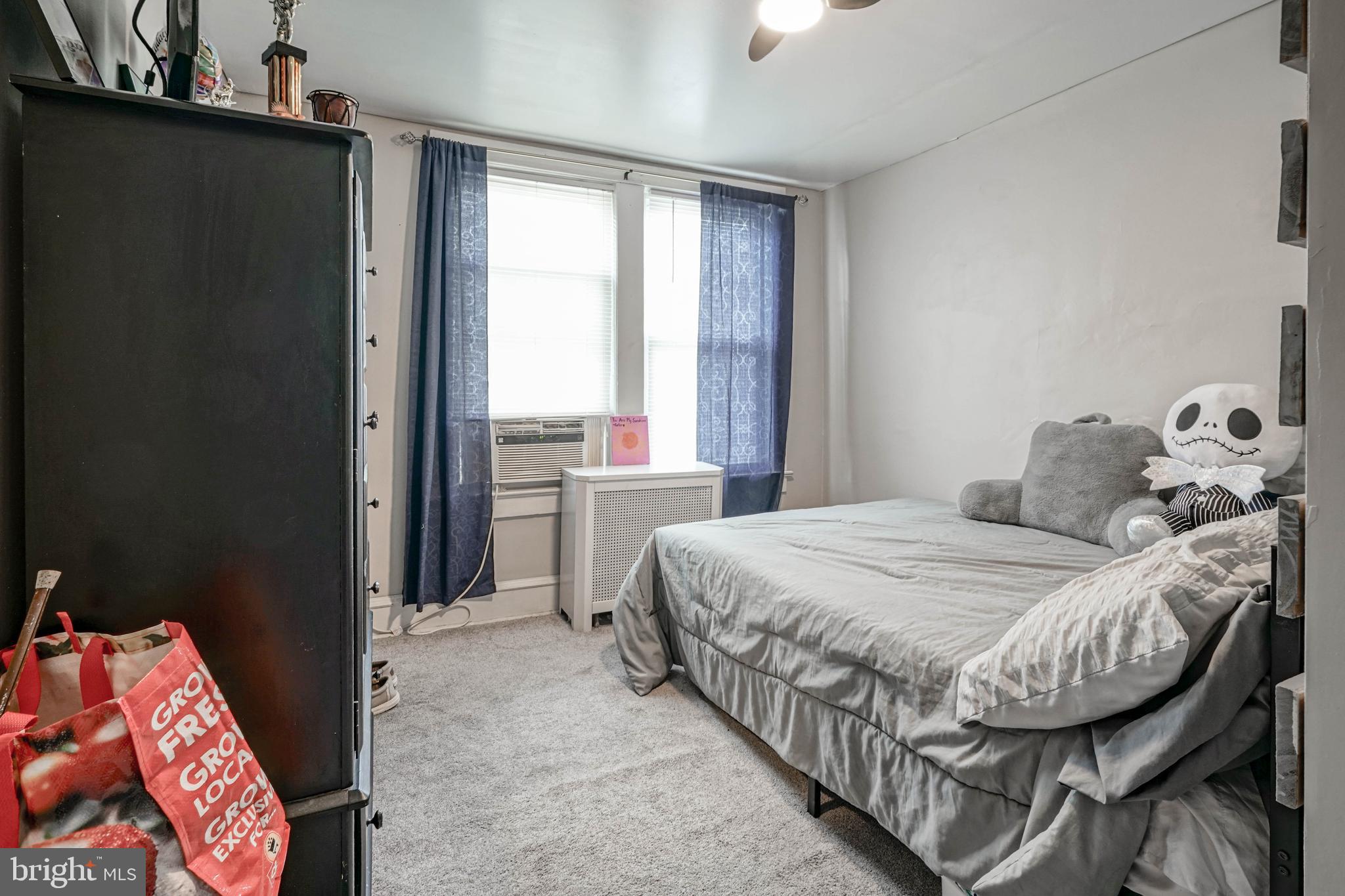 218 Walnut Street Audubon, NJ 08106 - Photo 29 of 40 a bedroom with a bed and a window