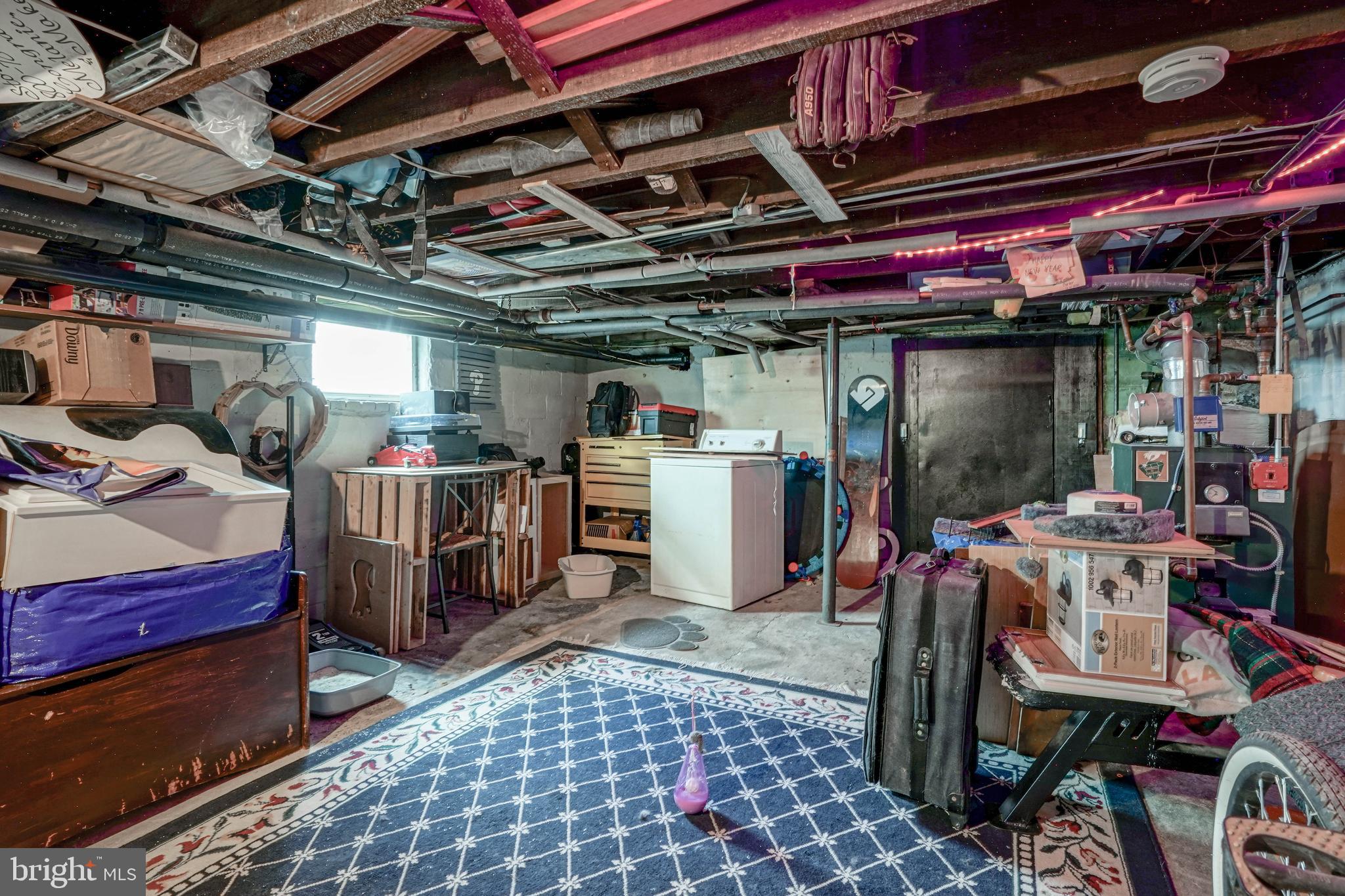 218 Walnut Street Audubon, NJ 08106 - Photo 33 of 40 a view of a storage area with a table and chairs
