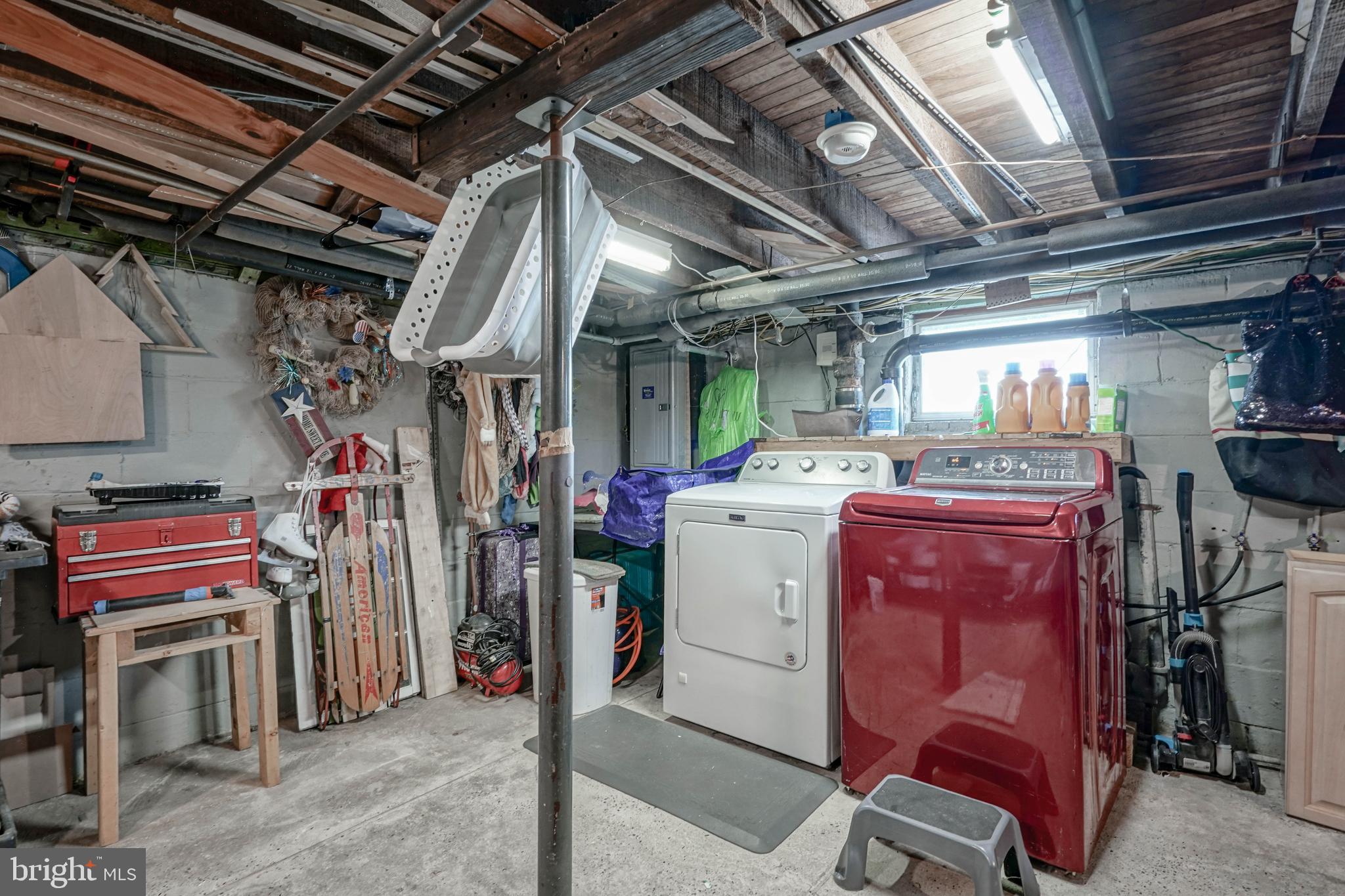 218 Walnut Street Audubon, NJ 08106 - Photo 35 of 40 a storage room with washer and dryer