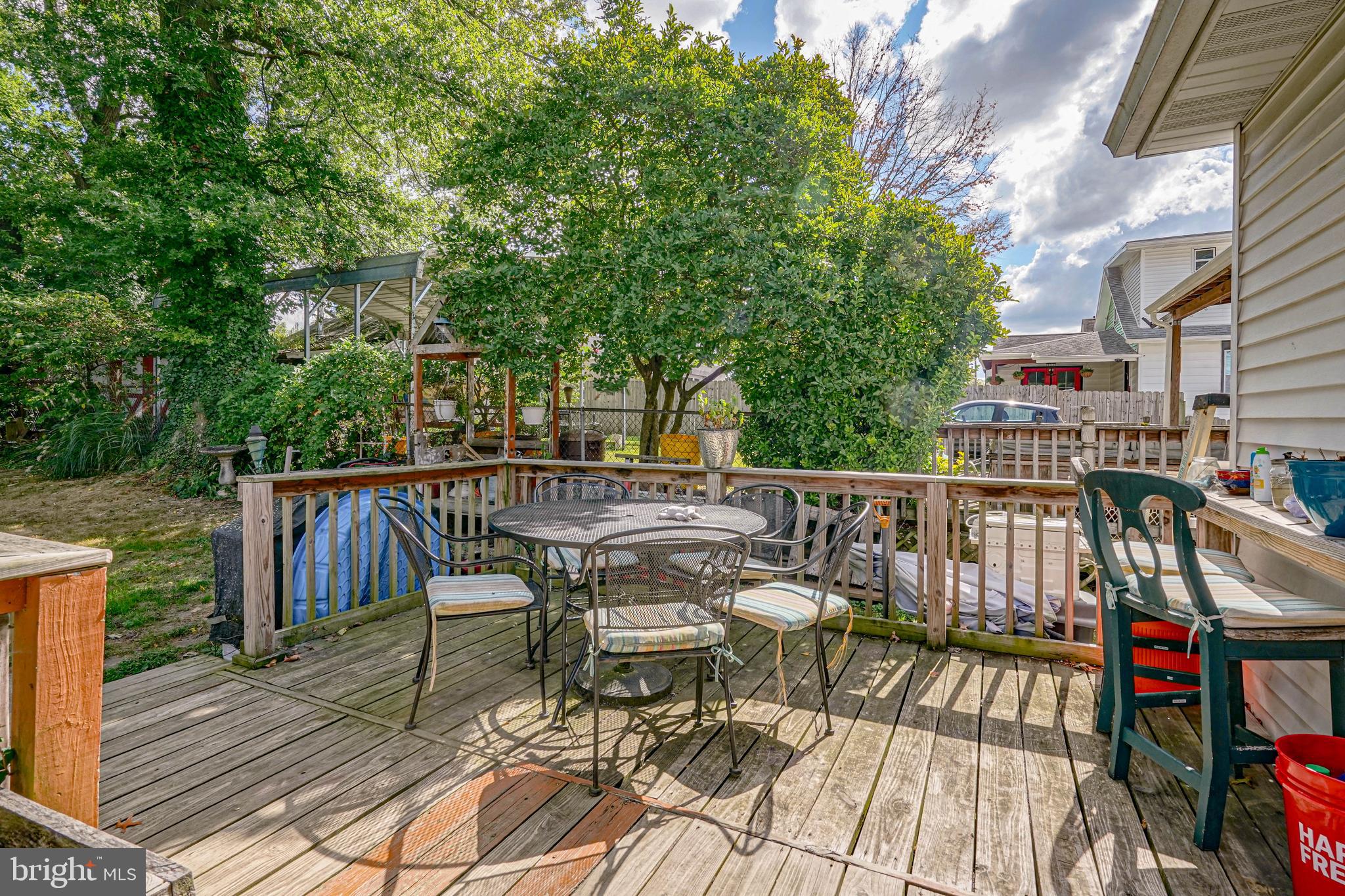 218 Walnut Street Audubon, NJ 08106 - Photo 39 of 40 a view of a deck with furniture and trees