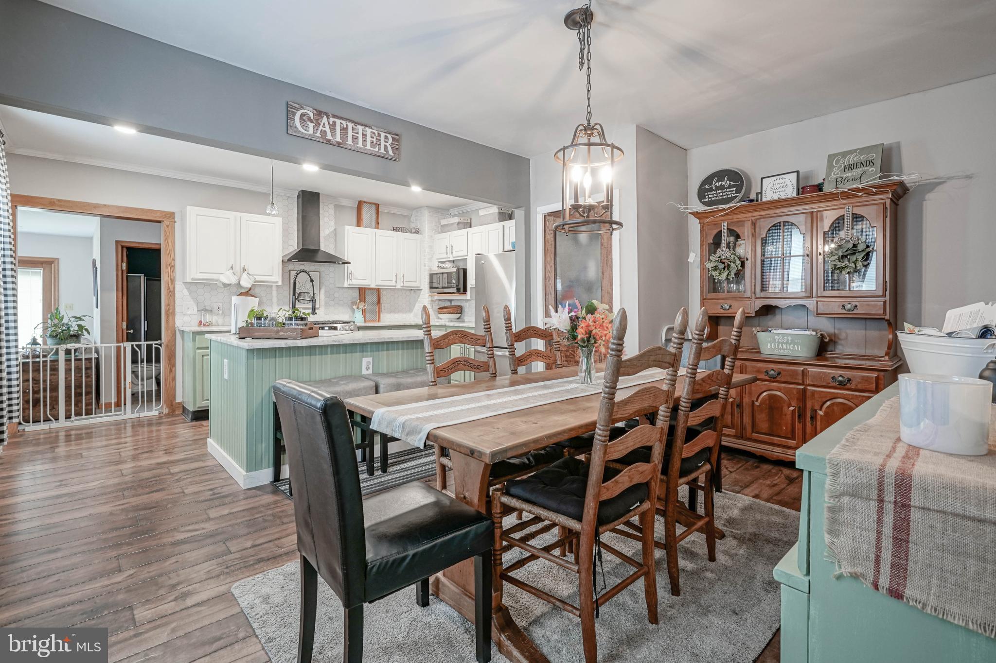218 Walnut Street Audubon, NJ 08106 - Photo 8 of 40 a view of a dining room with furniture wooden floor and chandelier