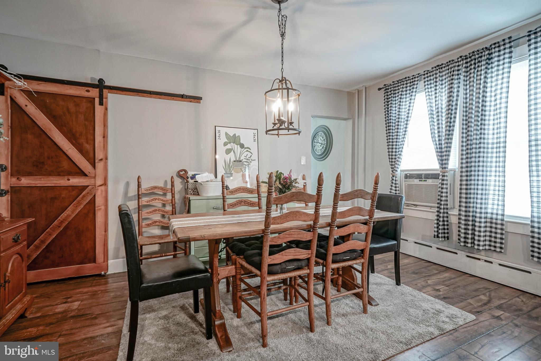 218 Walnut Street Audubon, NJ 08106 - Photo 10 of 40 a view of a dining room with furniture window and wooden floor