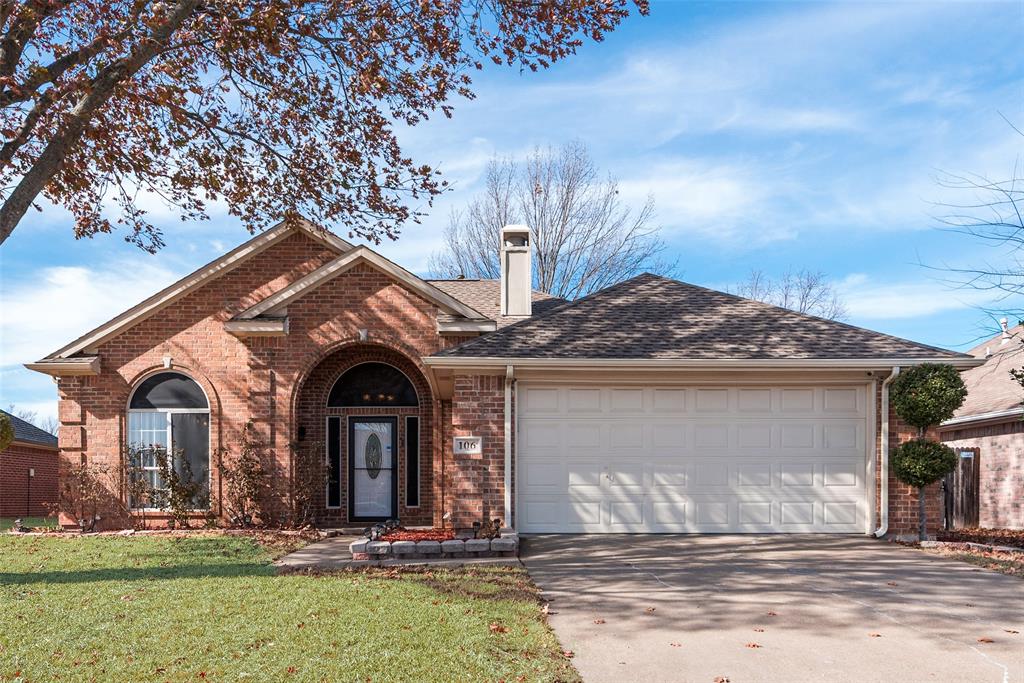 106 Villanova Circle Forney, TX 75126 - Photo 4 of 26 a front view of a house with garden