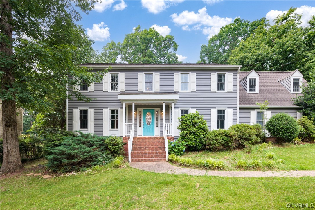 1424 Shirlton Road Midlothian, VA 23114 - Photo 1 of 42 a front view of a house with garden