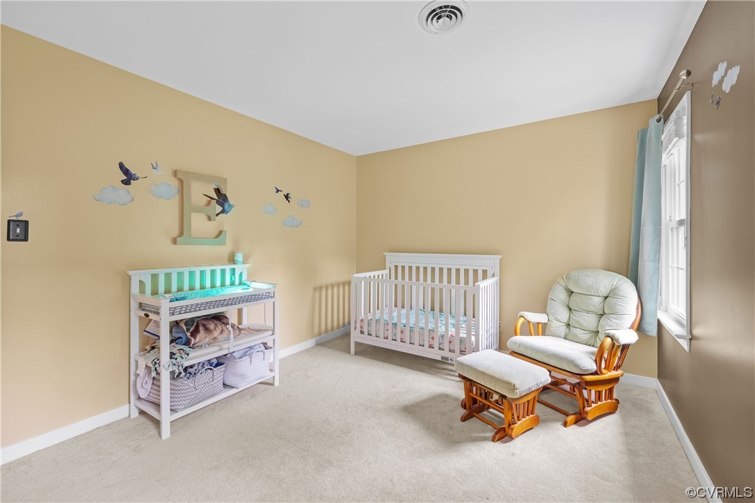 1424 Shirlton Road Midlothian, VA 23114 - Photo 25 of 42 a room with furniture and a window