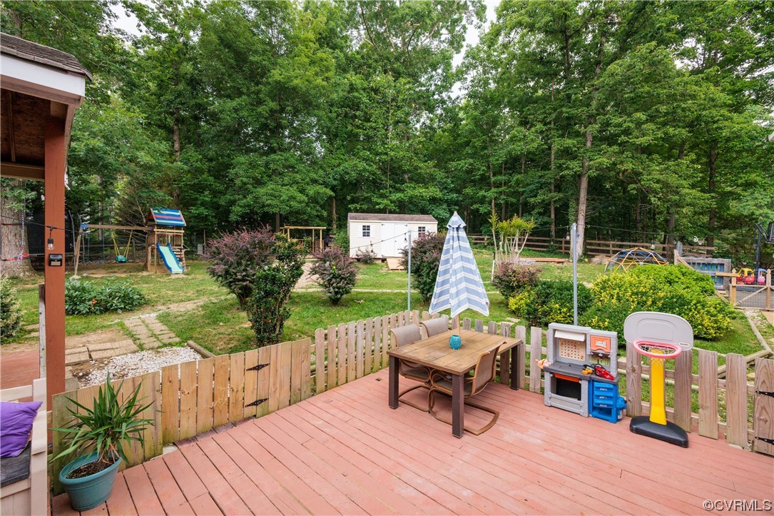 1424 Shirlton Road Midlothian, VA 23114 - Photo 33 of 42 a view of a wooden deck and a patio