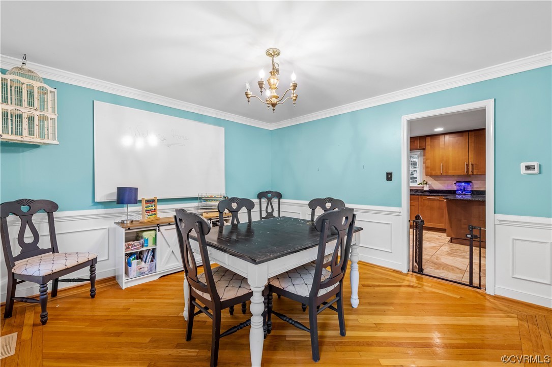 1424 Shirlton Road Midlothian, VA 23114 - Photo 7 of 42 a view of a dining room with furniture