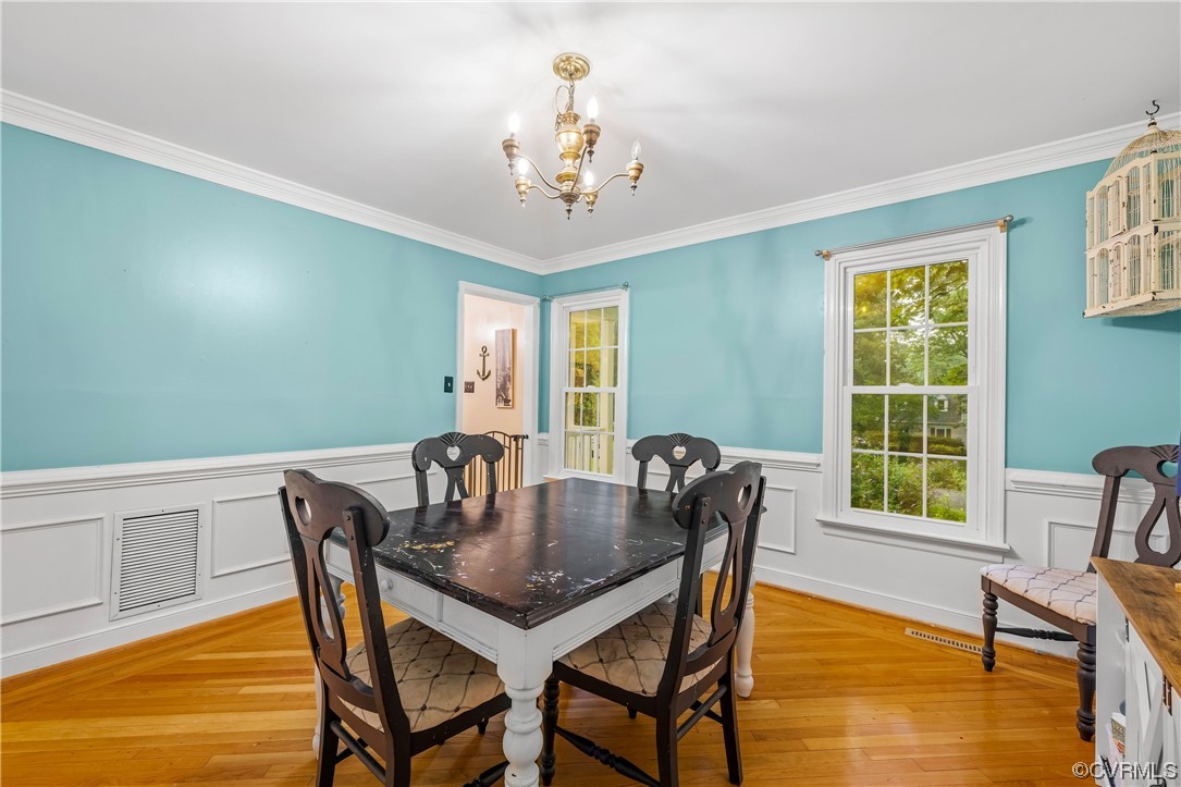 1424 Shirlton Road Midlothian, VA 23114 - Photo 8 of 42 a view of a dining room with furniture and window