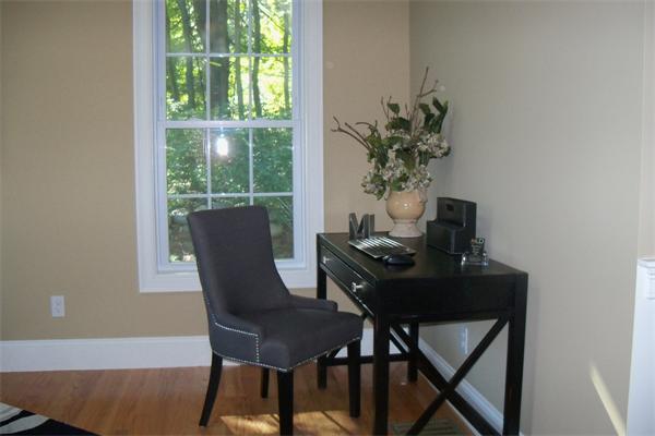 73 Fuller Brook Road Wellesley, MA 02482 - Photo 5 of 17 a view of a workspace with furniture and a window