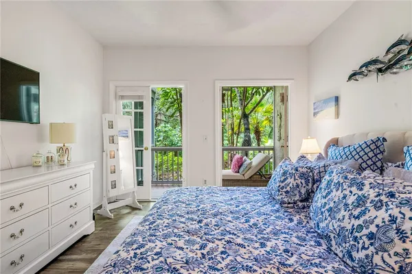 a bed room with a bed and a window