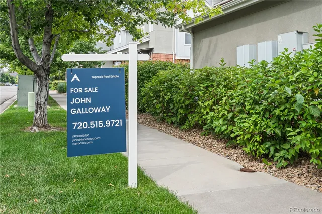 a sign on the side of the road