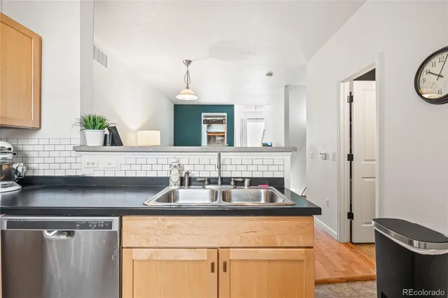 a kitchen with a sink and a cabinets