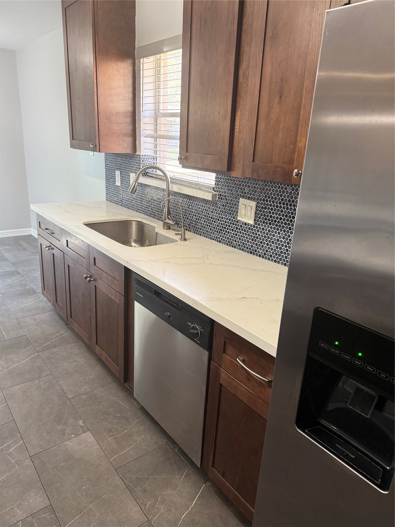 4642 Deer Point Drive Spring, TX 77389 - Photo 8 of 13 This home includes the newer microwave and refrigerator.