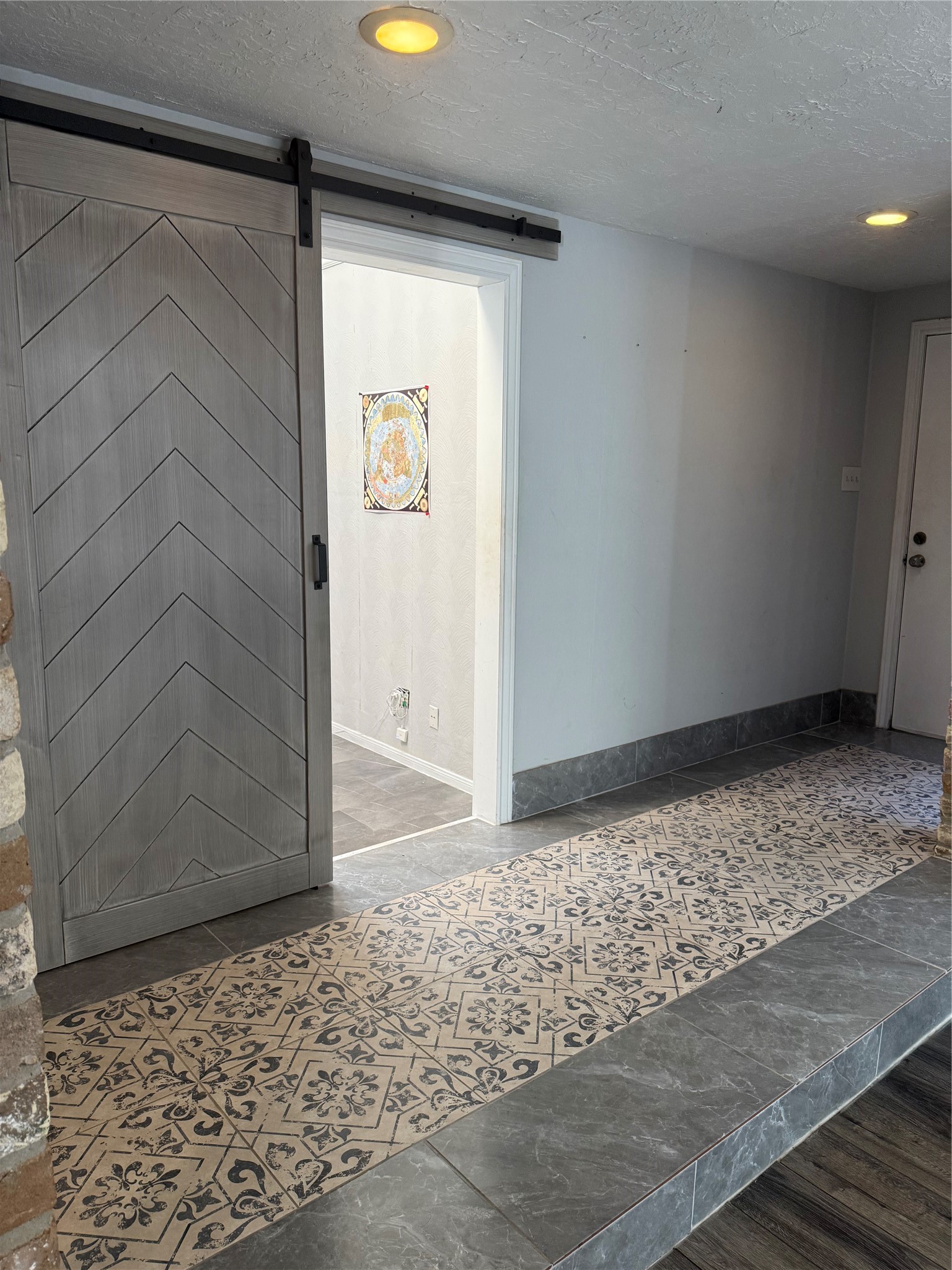 4642 Deer Point Drive Spring, TX 77389 - Photo 9 of 13 Front entry with farm-style door as entry into an office area.