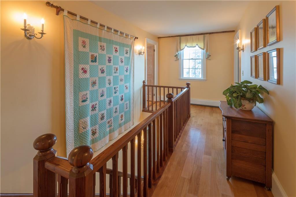 196 Perkins Street Castine, ME 04421 - Photo 24 of 34 Up stairs landing leading to three...