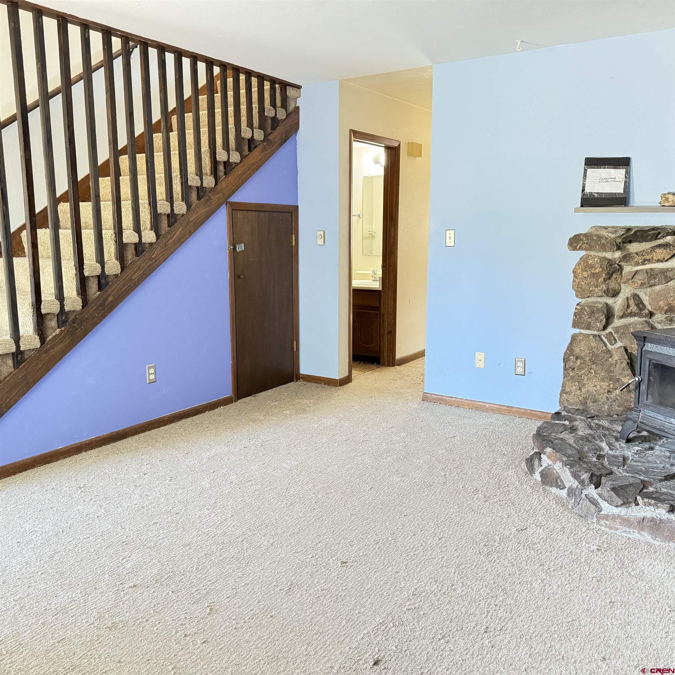 1021 West Denver Avenue, Unit 4 Gunnison, CO 81230 - Photo 12 of 26 a view of a livingroom with wooden floor