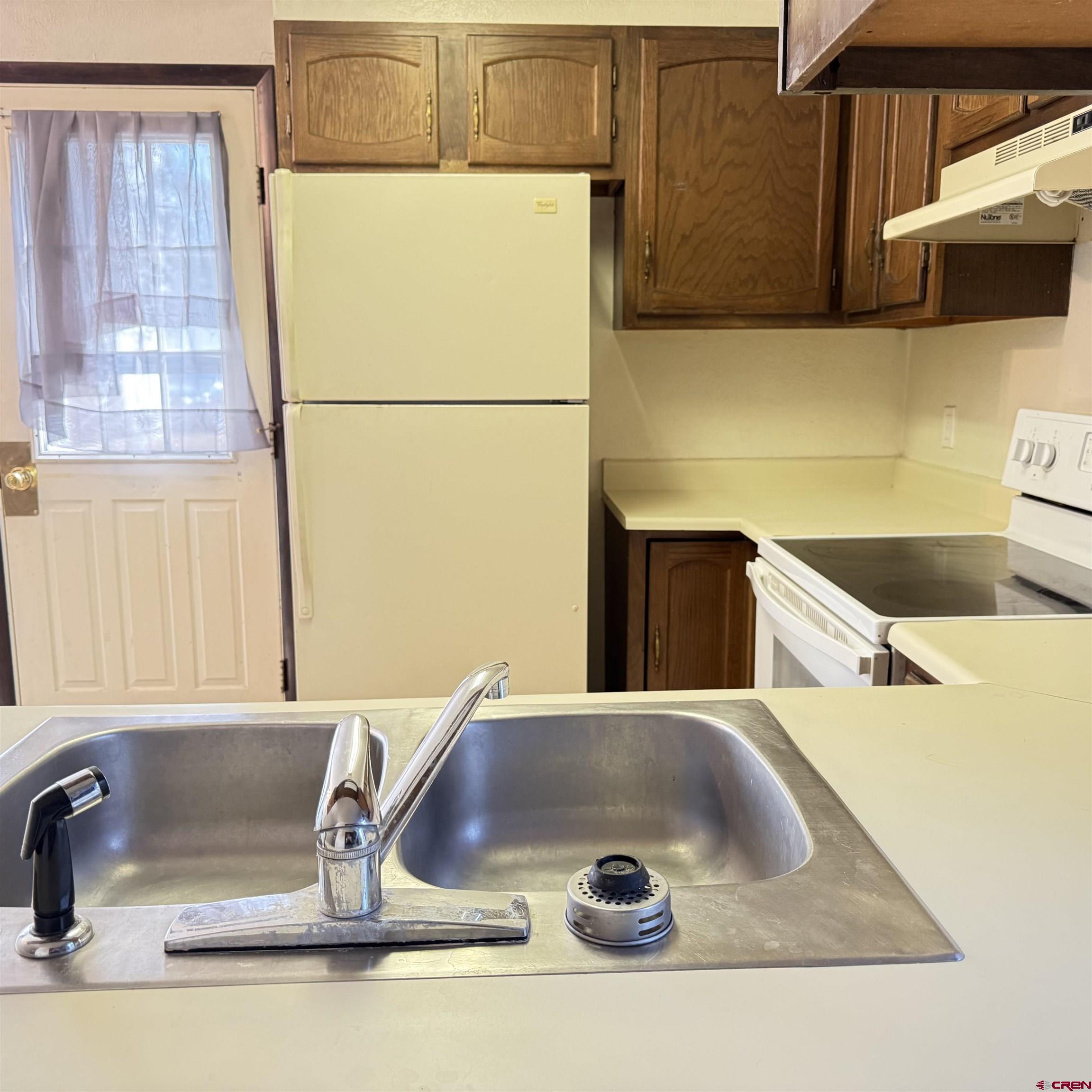 1021 West Denver Avenue, Unit 4 Gunnison, CO 81230 - Photo 15 of 26 a view of a kitchen with a sink