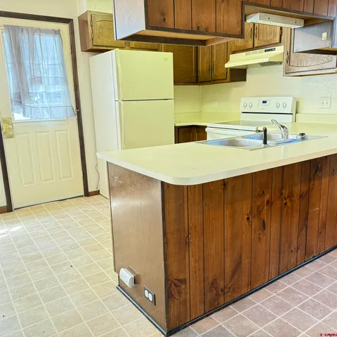 a bathroom with a toilet and a sink