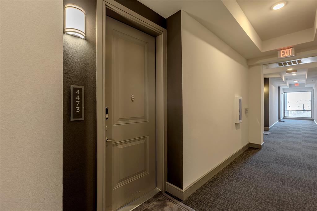 2700 Old Denton Road, Unit 4473 Carrollton, TX 75007 - Photo 15 of 27 a view of a hallway with wooden floor